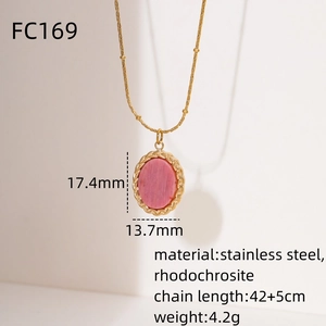 Detailed close-up of 18K gold stainless steel necklace with pink oval rhodochrosite stone