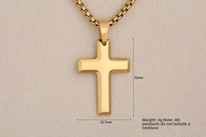 Vue détaillée du pendentif croix en acier inoxydable doré 32mm avec ses dimensions
