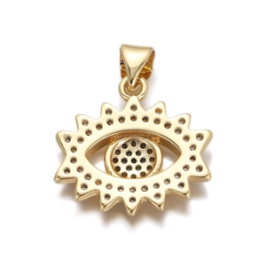 Detailed view of a gold-plated evil eye sun pendant for DIY jewelry making