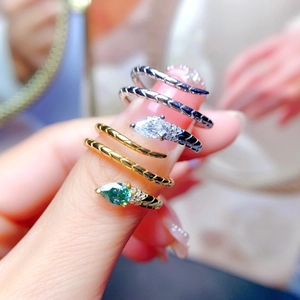 Luxe pear-cut moissanite snake ring with spiral band for women in gold and silver