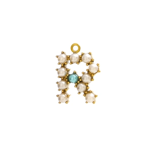 Detailed view of golden letter R pendant with white pearls and a blue stone inlay