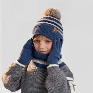 Navy blue kids' winter set with knitted beanie, striped scarf, and gloves for cold weather
