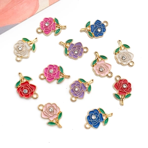 Detail of rose enamel pendants with sparkling rhinestones for DIY jewelry making