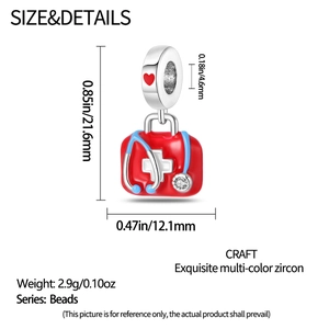 Macro shot of silver medical bead charm showing doctor bag and stethoscope details