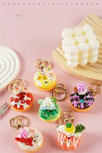 Detailed view of colorful mini donut keychains with various topping textures and charms