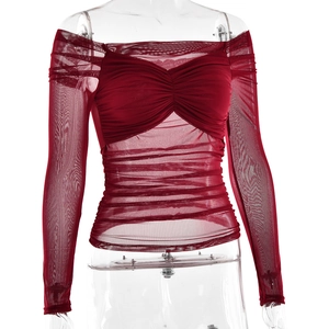 Detail of burgundy mesh off-shoulder top with elegant ruched texture and slim fit