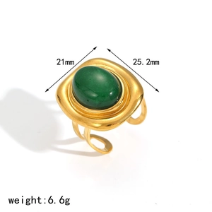 Detail view of adjustable gold ring with oval green gemstone including size measurements