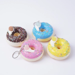 Porte-clés donuts en PU à rebond lent avec perles de sucre colorées en quatre couleurs