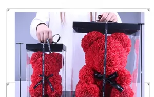 Size comparison of 28cm and 40cm red PE foam rose bears in transparent gift boxes