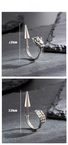 Macro detail of silver dragon punk earring with spike tip and dimensions display