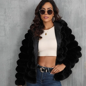 Women's black hooded faux fur jacket with bubble texture and cozy plush finish