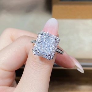 Macro shot of S925 silver ring featuring radiant cut lavender cubic zirconia with halo
