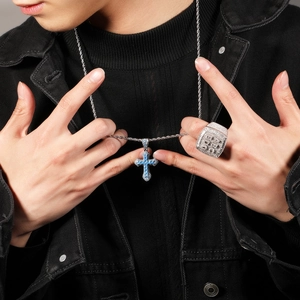 Hip hop silver necklace with blue zircon cross pendant and pavé square ring set on model
