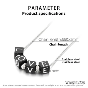 Macro detail of LOVE cube pendant on stainless steel snake chain showing 8mm dimensions