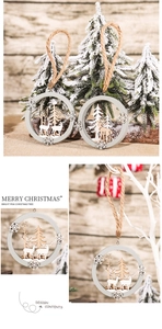 Detail of laser-cut wooden reindeer and forest scene Christmas ornament with jute rope