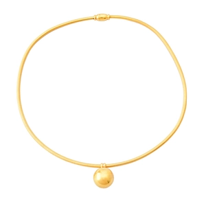 Polished gold metal ball pendant on omega chain necklace with minimalist chic aesthetic