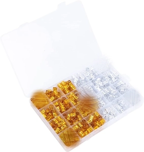 Clear storage box with compartments for gold and silver hollow metal braid cuffs and beads