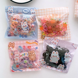 Elastic colorful rubber hair ties in cute cartoon packaging for girls hairstyles