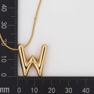 Detailed scale measurement showing the 25mm polished gold puffy letter W pendant