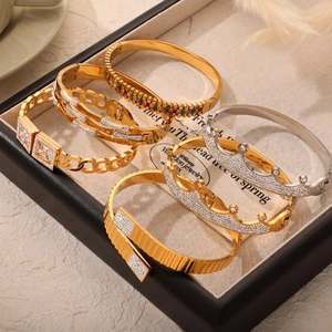 Elegant titanium steel bangles set with colorful crystals and geometric luxury designs
