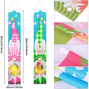 Detail of Easter gnome banners showing metal grommets, stitching, and fabric texture