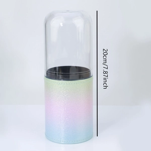 Detail of 20cm cylindrical makeup brush holder with gradient glitter base and clear lid