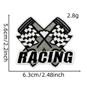 Detail of racing themed embroidery patch with checkered flag and racing lettering