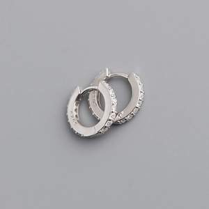 Detailed macro view of S925 sterling silver hoop earrings with micro-set zircons