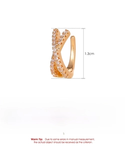 Detail view of 1.3cm rose gold criss-cross ear cuff with white cubic zirconia accents