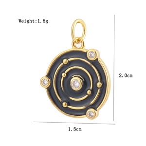 Macro detail of 18K gold plated sun and moon pendant with measurements and cubic zirconia