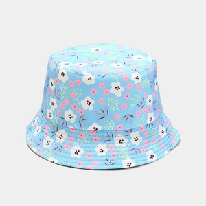 Close-up of sky blue sun hat with floral pattern and detailed brim stitching