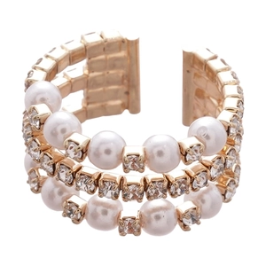 Elegant multi-layer gold ring with pearls and crystals in a minimalist open design