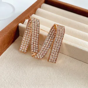 Exquisite sparkling M letter brooch with gold plating and paved rhinestones for women