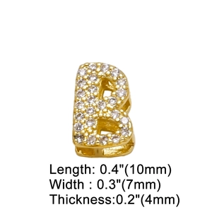 Macro detail of gold letter B pendant with cubic zirconia and exact size dimensions