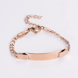 Macro shot of rose gold stainless steel ID bracelet with blank engravable nameplate