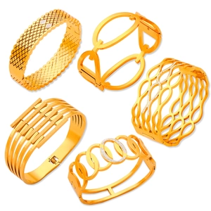 Luxurious gold-plated titanium steel bangles with hollow geometric patterns and zircons