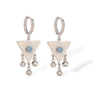 Detail view of silver evil eye geometric drop earrings with blue inlay and clear zircons