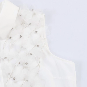 Chemisier blanc sans manches pour femme avec appliques florales et broderies perlées