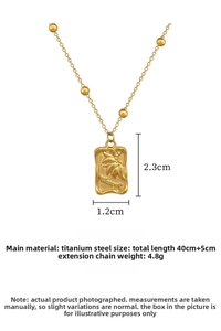 Detail of titanium steel rectangular pendant with Dream text and sunflower engraving