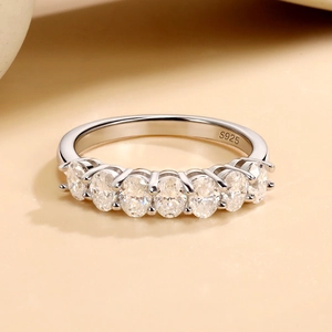 Elegant S925 sterling silver ring with seven oval moissanite stones in a row