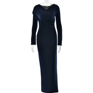 Detail of elegant navy blue long-sleeve dress with pleated V-neck and ruched waist
