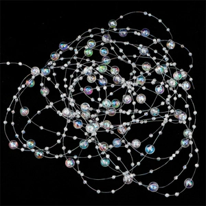 Close-up of iridescent acrylic bead chain with rainbow luster for DIY wedding decor