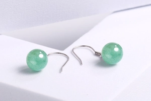 Detailed view of elegant green aventurine jade bead earrings with silver hooks