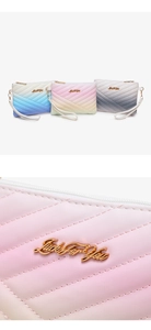Detail of gradient PU leather clutch bags with quilted pattern and gold logo hardware