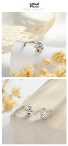 Macro shot of silver hollow star ear cuffs with a high-polished metallic finish