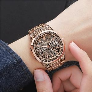 Men's retro bronze steel calendar watch with black engraved patterns and date display