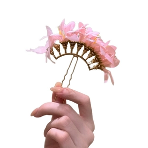 Elegant pink fabric flower hair fork for traditional Chinese hairstyles and updos.