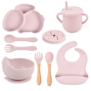 Pink silicone baby feeding set with divided plate, bowls, cups, bib and wooden handle cutlery