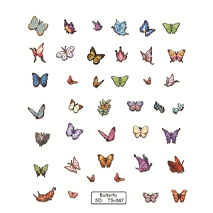 Vibrant 5D butterfly nail art stickers with realistic 3D relief effects and varied colors
