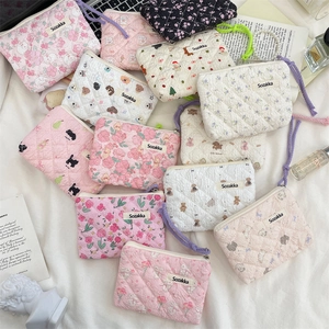Quilted floral pouches with diverse cute patterns and zippers for makeup and coins